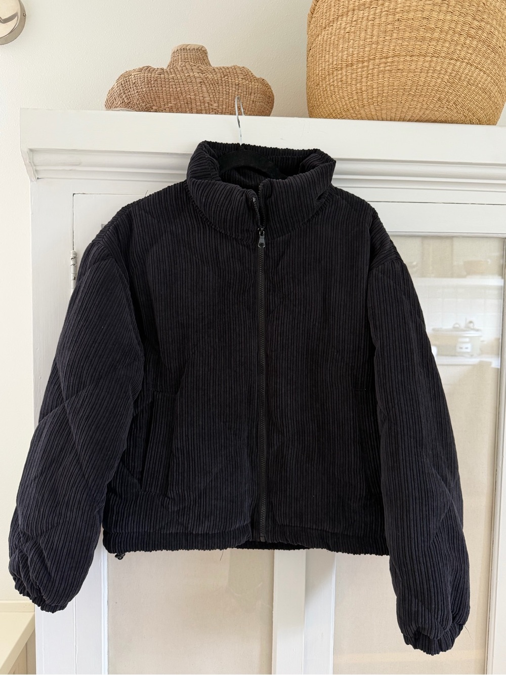 black corduroy puffer jacket